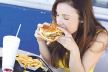 glavna--stockphotobeautifulyoungladyeatingatastyburgeratanoutdoorcafehorizontalshot128684072.jpg