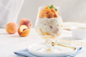 stockphotopeachesandcreamovernightoatshealthybreakfastmadewithoatssoakedforthenightinmilkor2206690035.jpg
