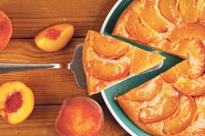 stockphotocloseuphomemadepiewithpeachesonwoodentabletopview2183148327.jpg