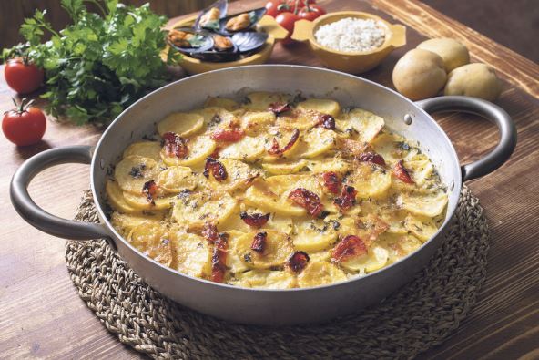 stock-photo-baked-potatoes-rice-and-mussels-in-metal-pan-2102723800.jpg